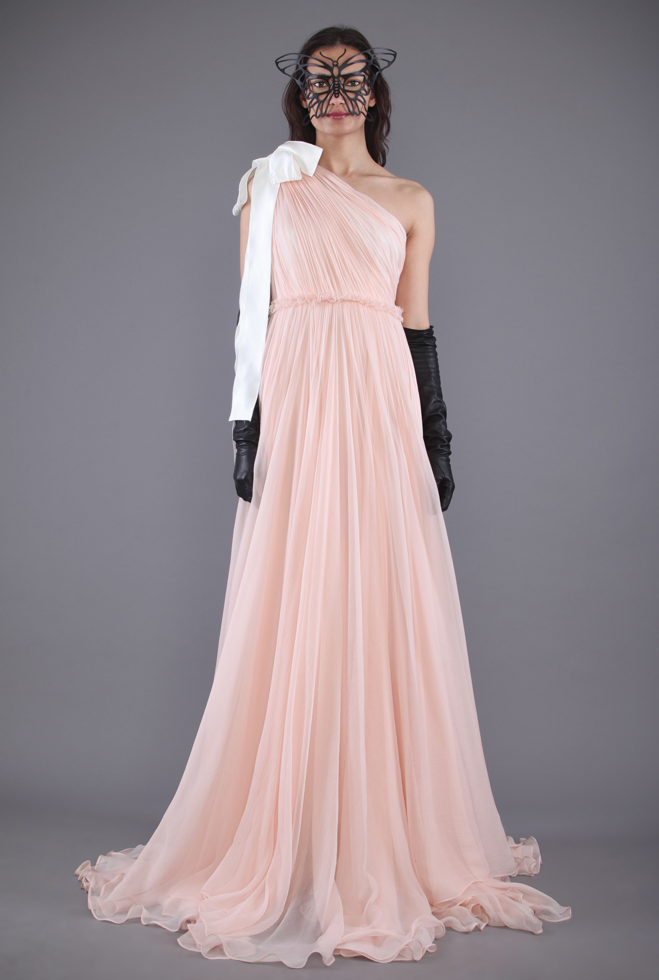 From blush pinks creams and soft grays all of her dresses are flowy and 